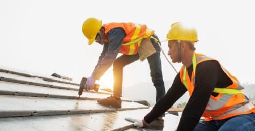 construction workers on a roof